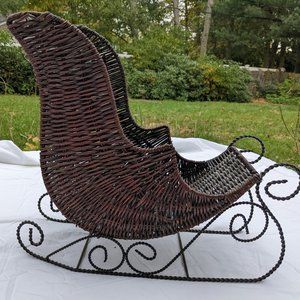 winter decoration brown wicker sleigh with metal "blade"